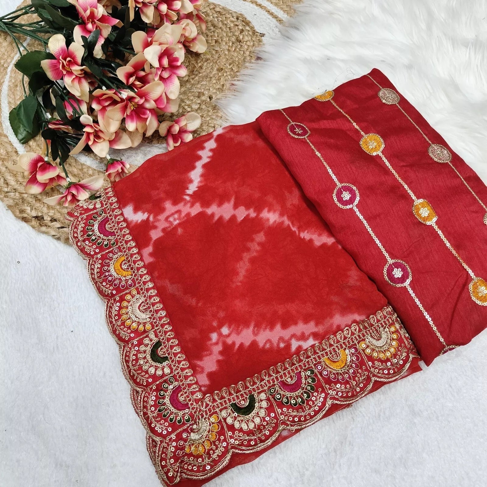 Soft Georgette Sari With Bhandhej Print And Designer Sari & Blouse