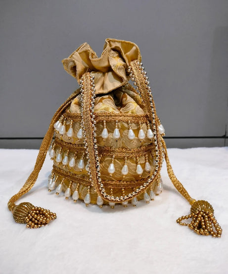 Designer Heavy Tassel Golden Work Potli Bag