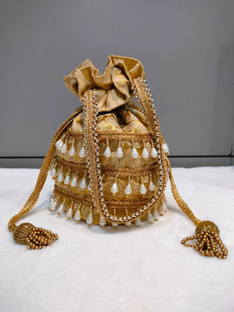 Designer Heavy Tassel Golden Work Potli Bag