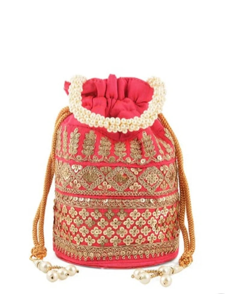 Embellished with Indian hand work potli bag