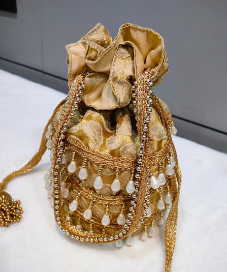 Designer Heavy Tassel Golden Work Potli Bag