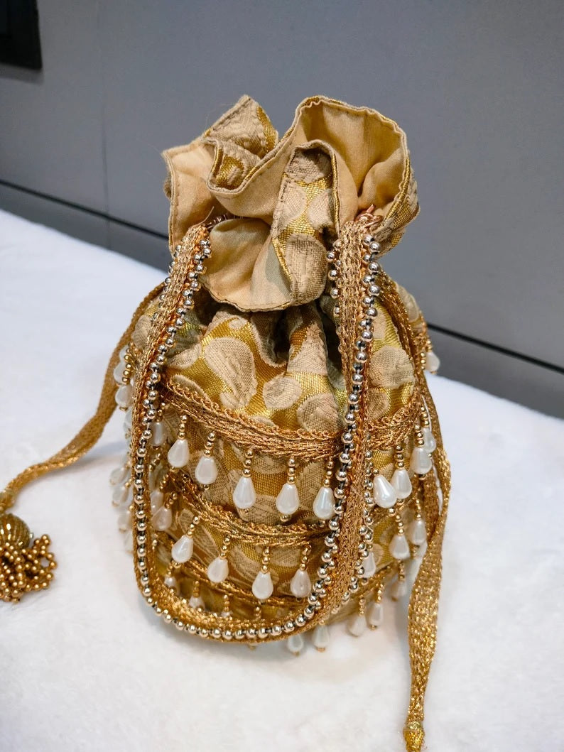 Designer Heavy Tassel Golden Work Potli Bag
