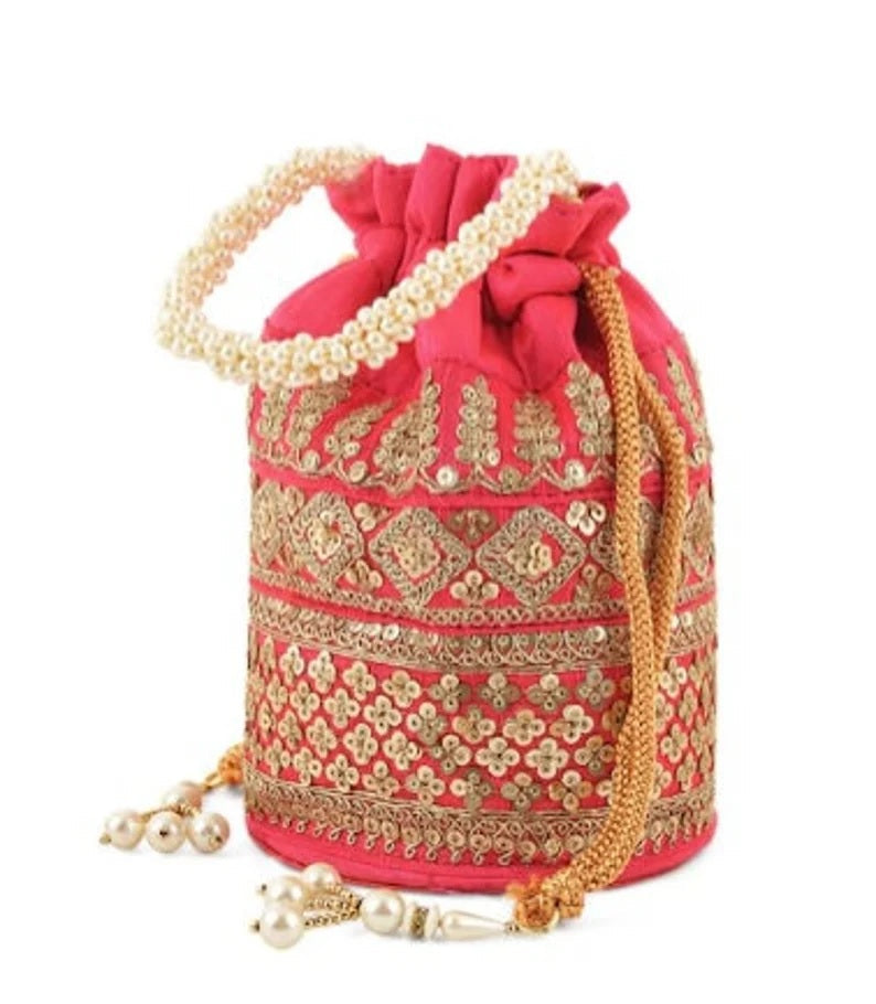 Embellished with Indian hand work potli bag