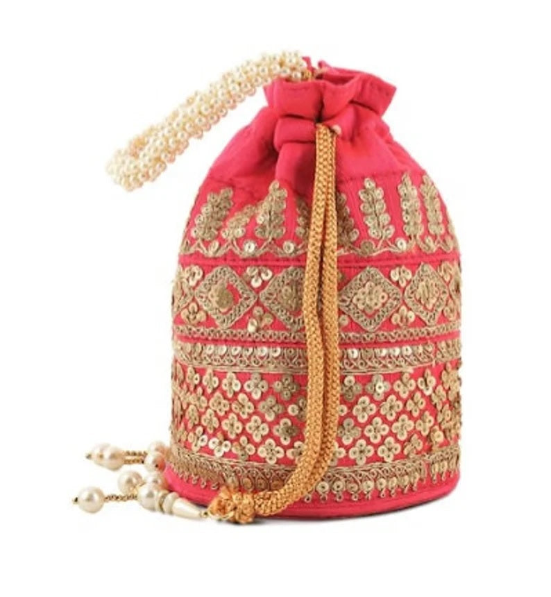 Embellished with Indian hand work potli bag