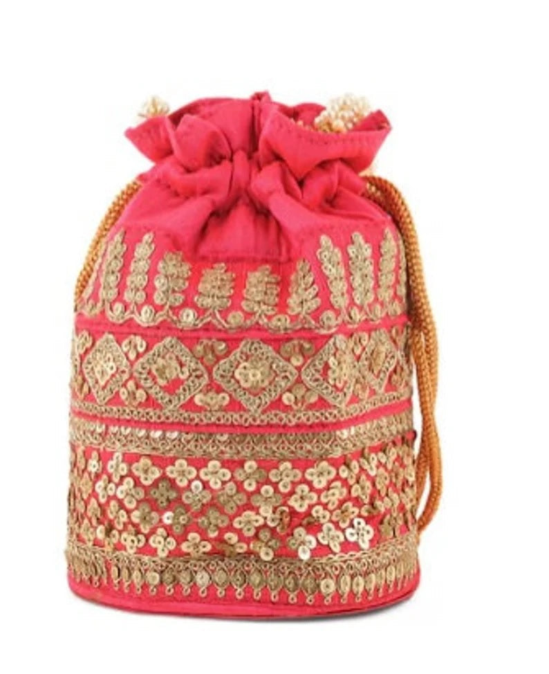 Embellished with Indian hand work potli bag