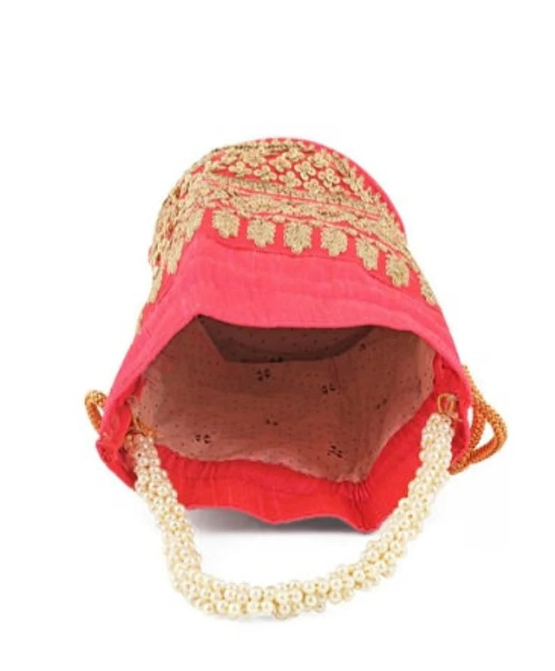 Embellished with Indian hand work potli bag