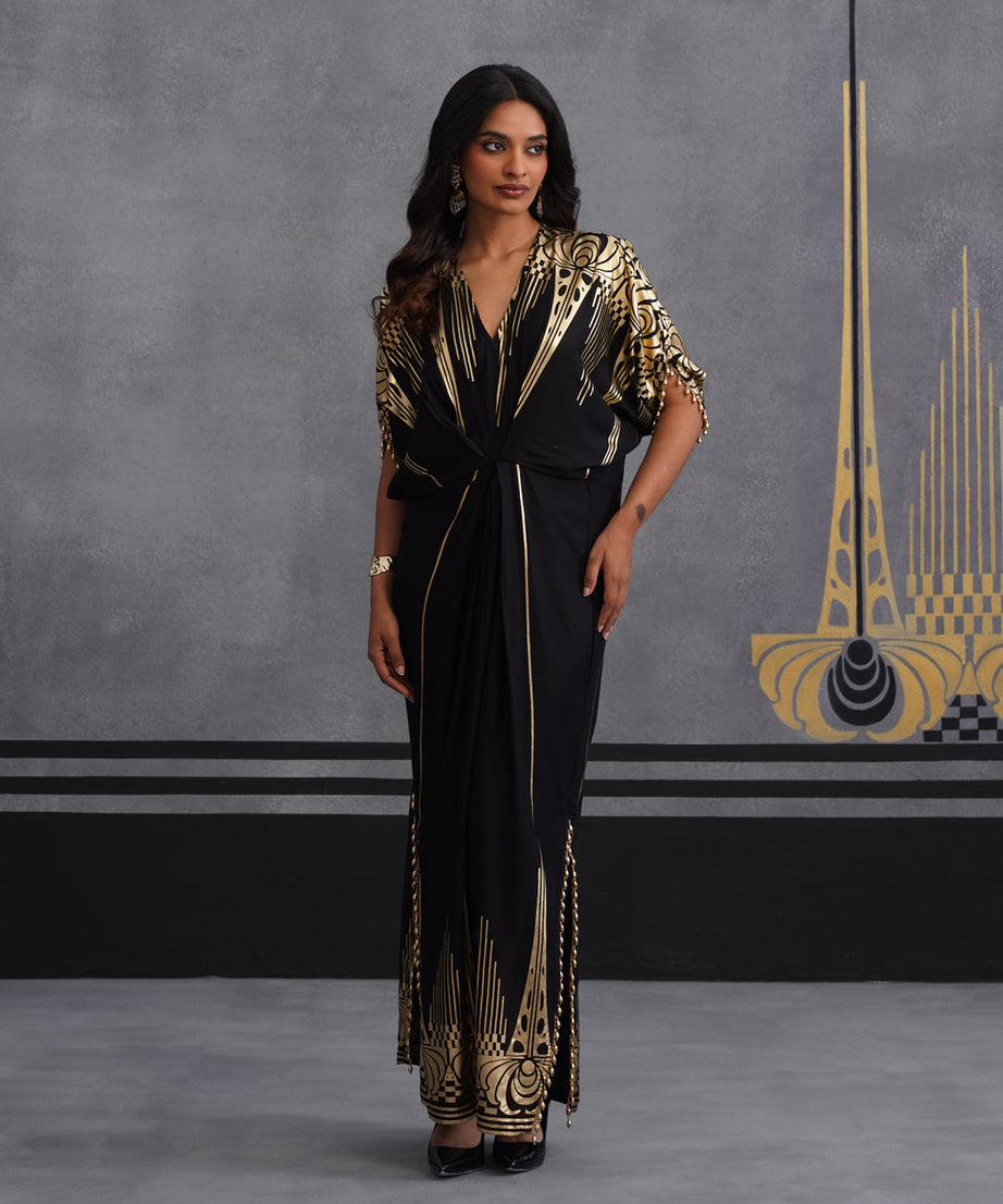 Elegant Black Maxi Dress with Gold Print and Side Slit