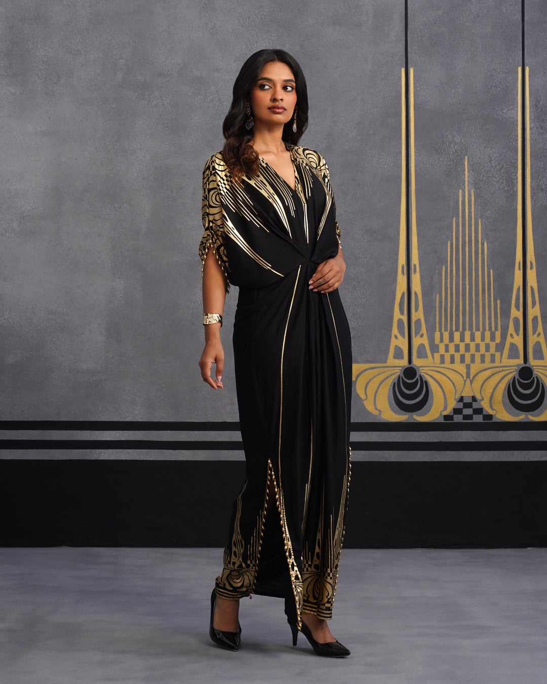 Elegant Black Maxi Dress with Gold Print and Side Slit