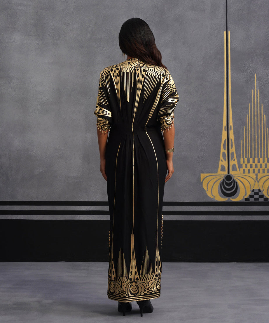 Elegant Black Maxi Dress with Gold Print and Side Slit