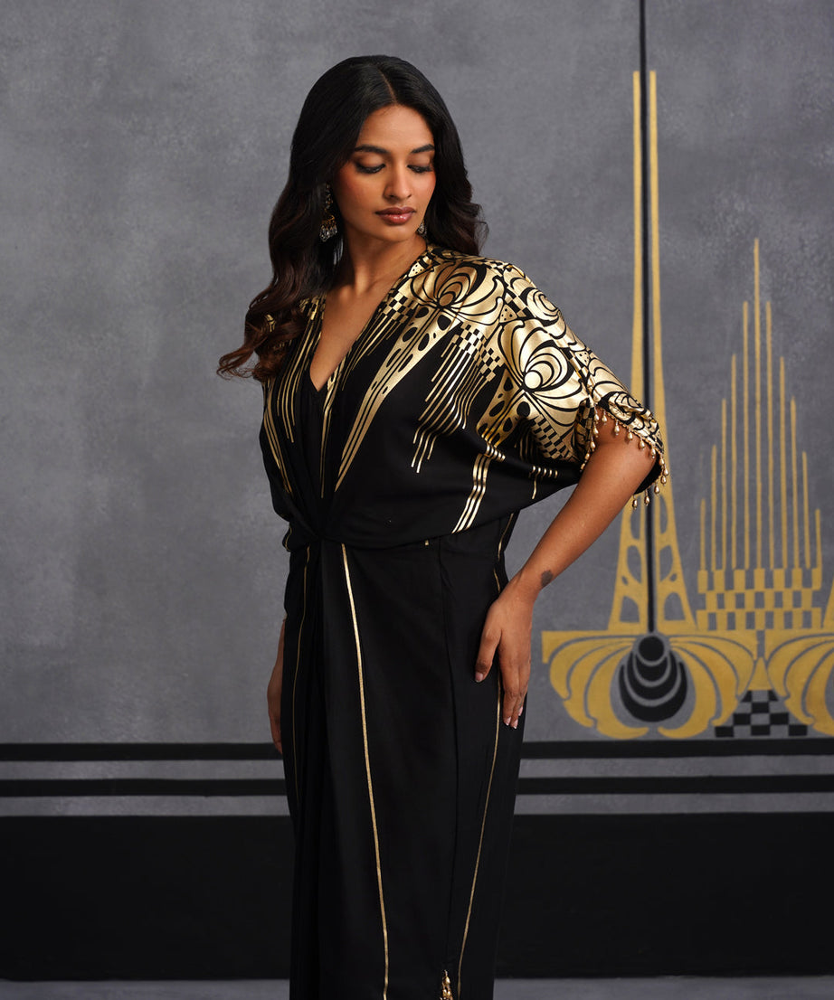 Elegant Black Maxi Dress with Gold Print and Side Slit