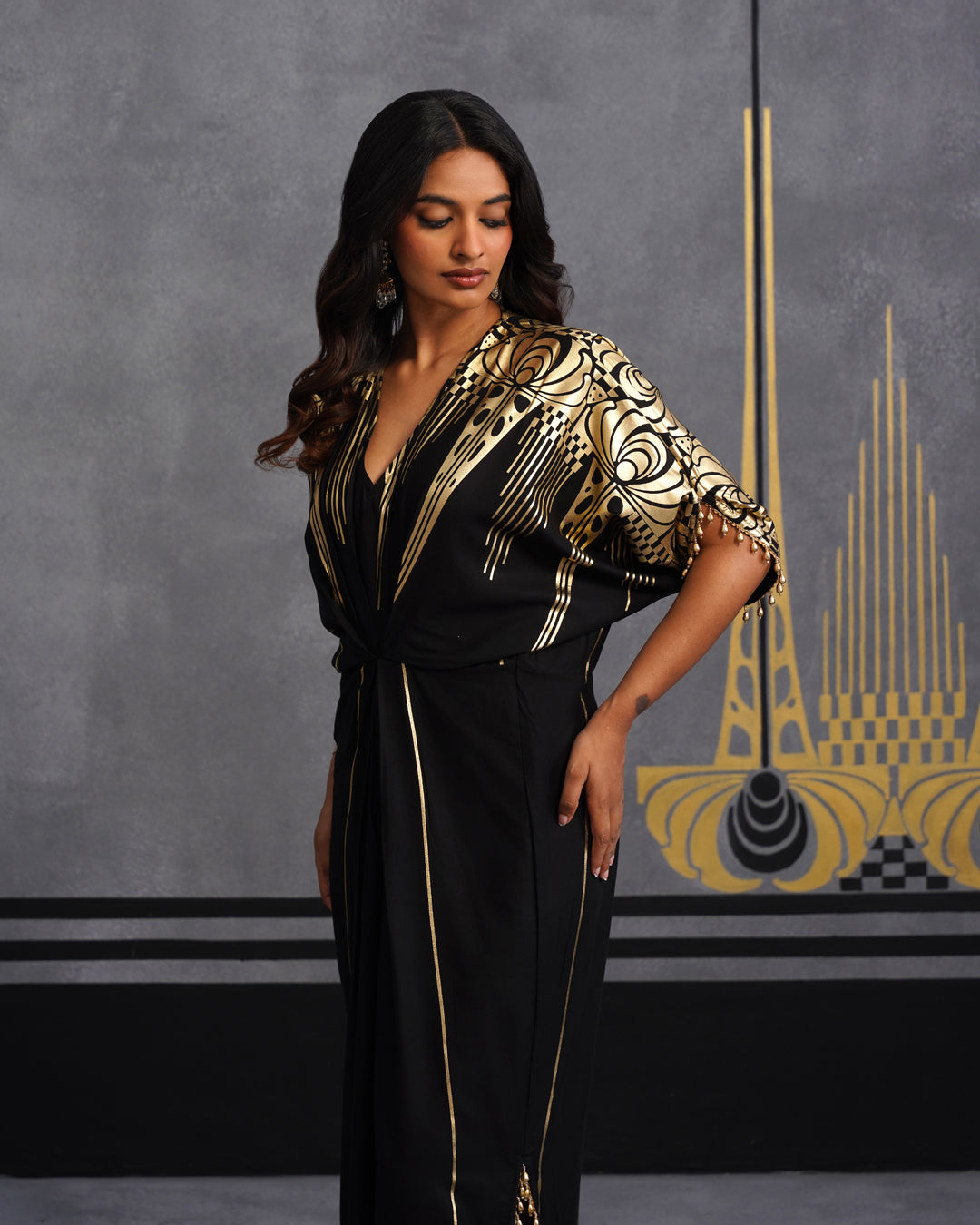 Elegant Black Maxi Dress with Gold Print and Side Slit