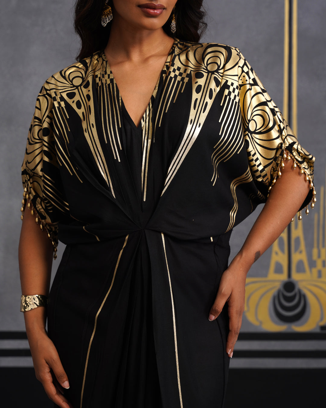 Elegant Black Maxi Dress with Gold Print and Side Slit