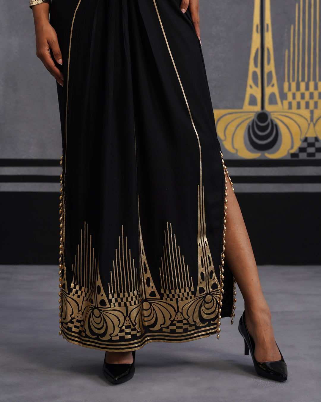 Elegant Black Maxi Dress with Gold Print and Side Slit